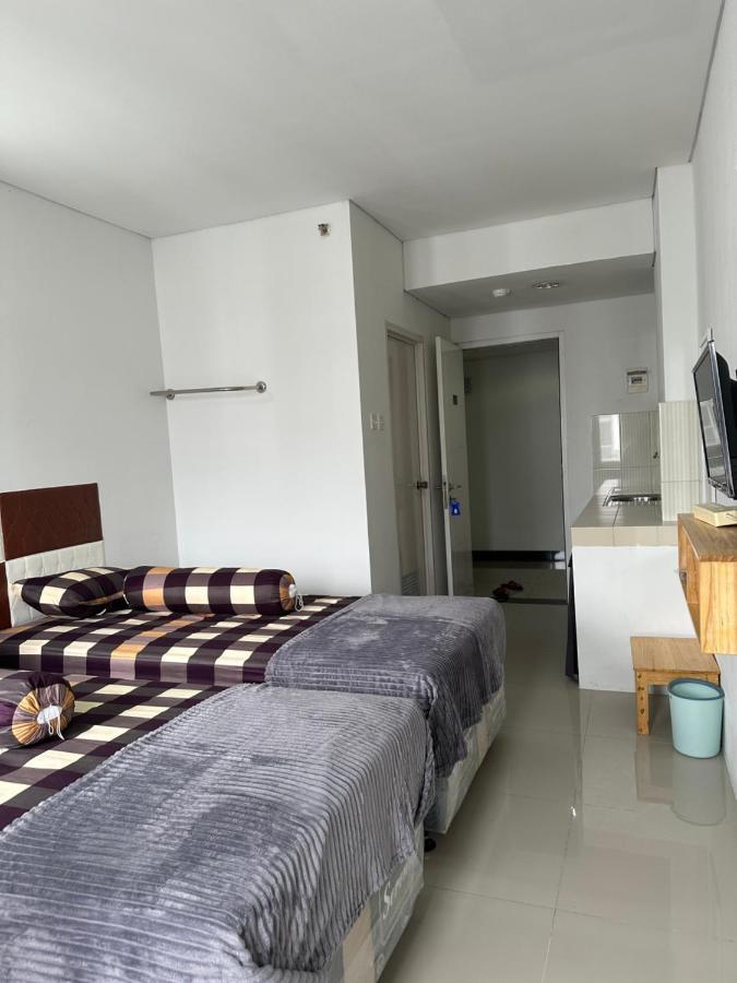 Grand Sentraland Manage By Laguna Apartemen *