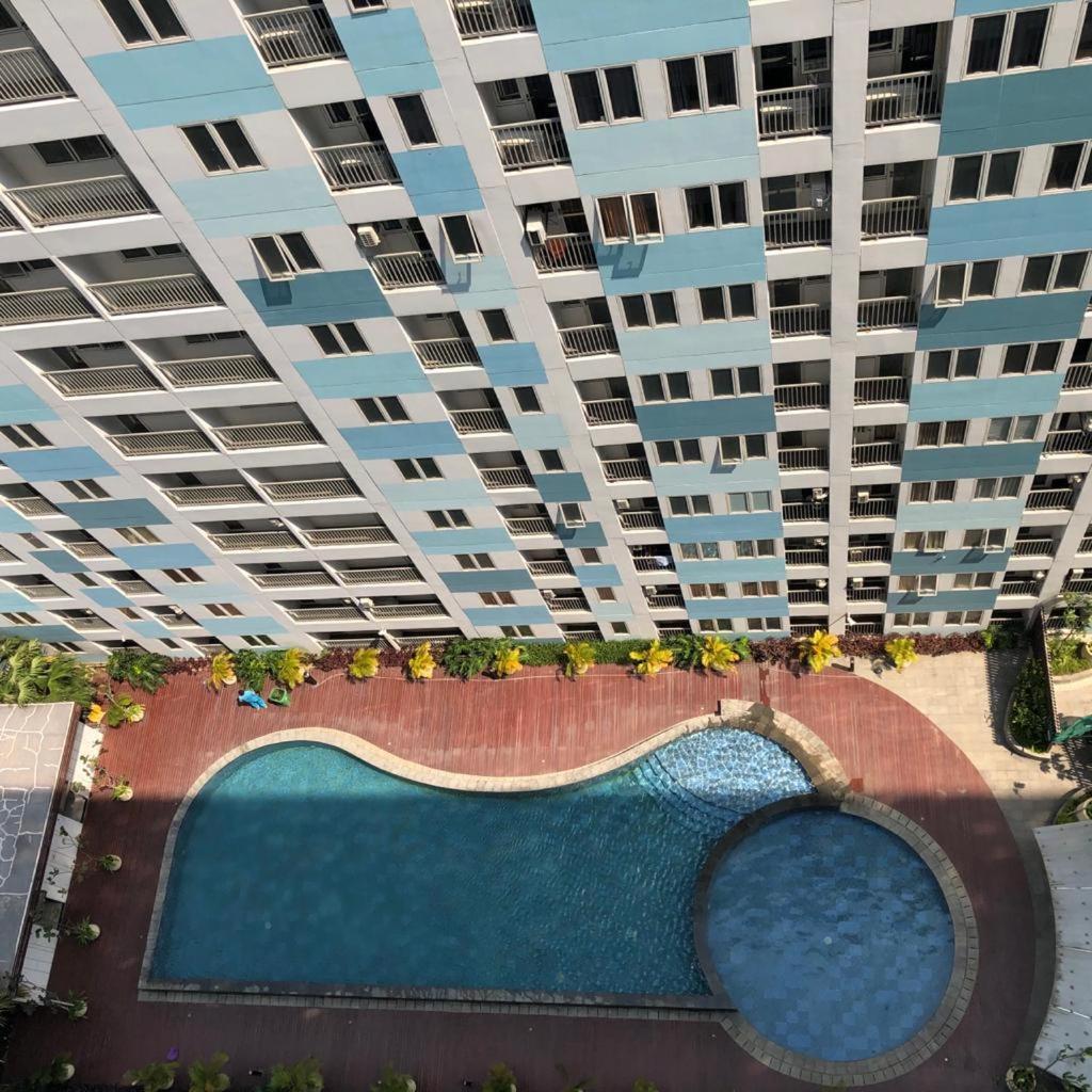 Grand Sentraland Manage By Laguna Apartemen *